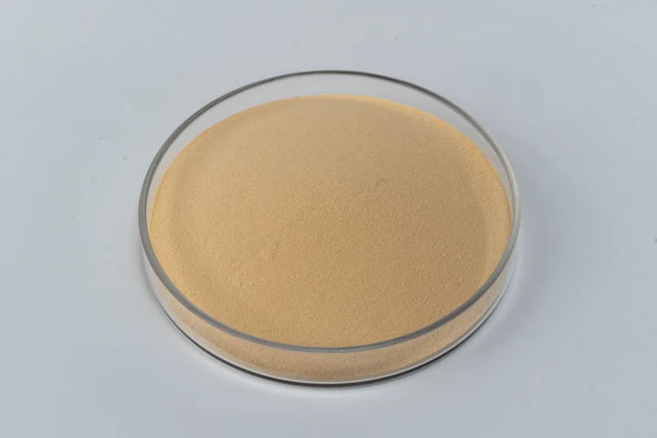 Meat broth flavor yeast extract powder sample in a glass dish